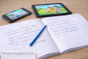 smartphone and tablet near student notebook showing reduced handwriting practice explained by HandwritingAone.com