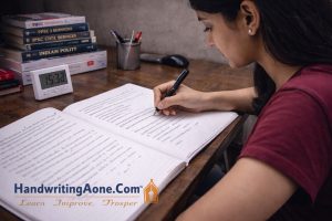 UPSC aspirant writing answers quickly in notebook during timed practice