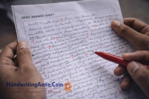 UPSC answer sheet with messy handwriting and corrections marked by examiner