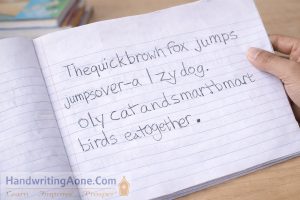 student writing simple sentences to improve handwriting speed and clarity guided by HandwritingAone.com