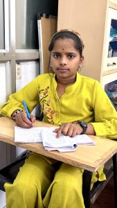 students writing in handwriting classes in vijayanagar bangalore at handwritingaone centre.